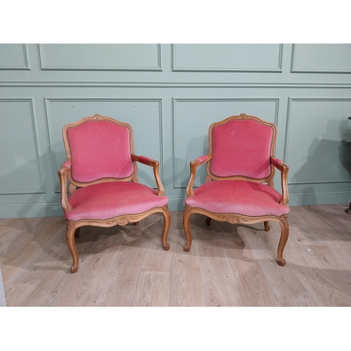 153 - Early 20th C. Pair of carved walnut and upholstered armchairs raised on cabriole legs. {85 cm H x 62... 