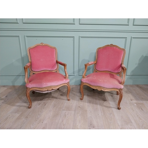 154 - Early 20th C. Pair of carved walnut and upholstered armchairs raised on cabriole legs. {85 cm H x 62... 