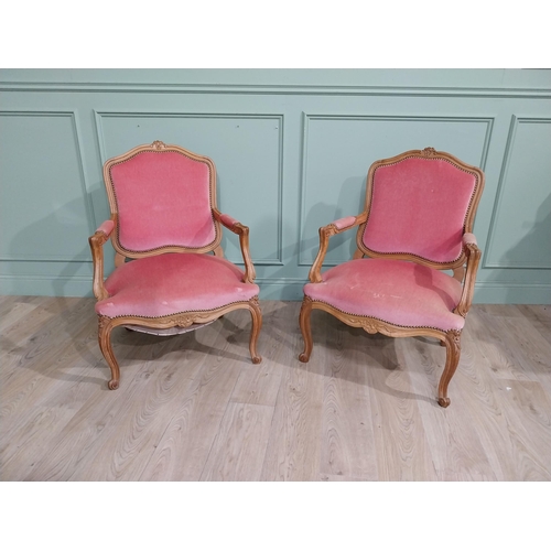 154 - Early 20th C. Pair of carved walnut and upholstered armchairs raised on cabriole legs. {85 cm H x 62... 