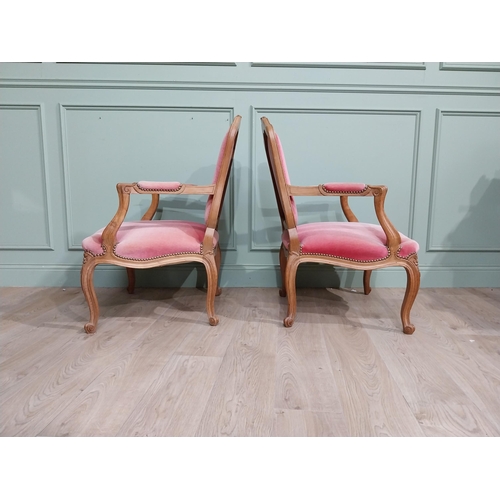 154 - Early 20th C. Pair of carved walnut and upholstered armchairs raised on cabriole legs. {85 cm H x 62... 