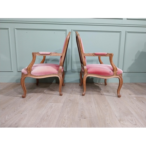 154 - Early 20th C. Pair of carved walnut and upholstered armchairs raised on cabriole legs. {85 cm H x 62... 