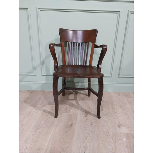 157 - Early 20th C. Mahogany office chair with slatted back, shaped arms on shaped legs. {84 cm H x 57 cm ... 