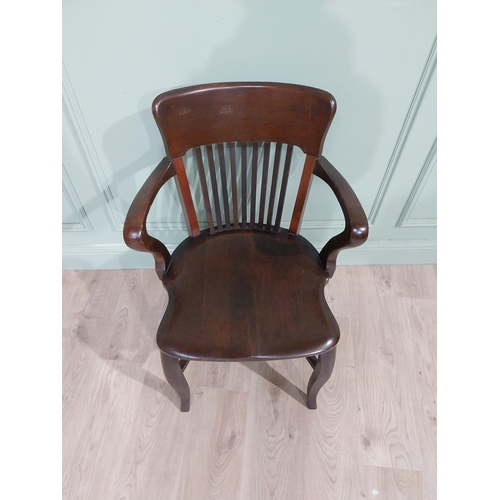 157 - Early 20th C. Mahogany office chair with slatted back, shaped arms on shaped legs. {84 cm H x 57 cm ... 