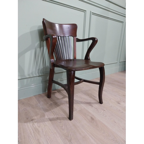 157 - Early 20th C. Mahogany office chair with slatted back, shaped arms on shaped legs. {84 cm H x 57 cm ... 