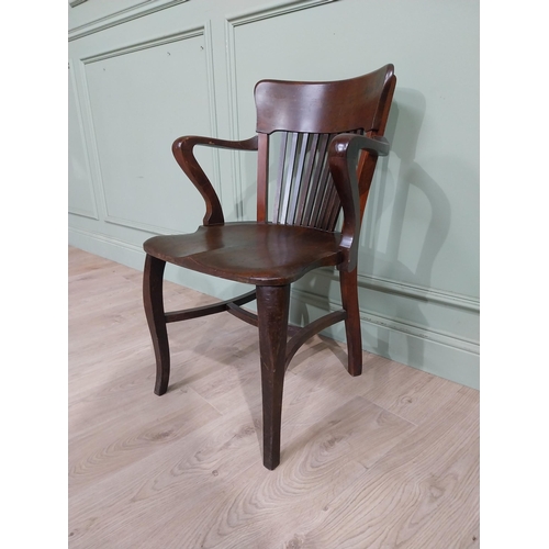 157 - Early 20th C. Mahogany office chair with slatted back, shaped arms on shaped legs. {84 cm H x 57 cm ... 