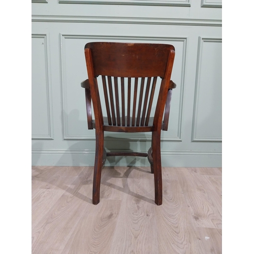 157 - Early 20th C. Mahogany office chair with slatted back, shaped arms on shaped legs. {84 cm H x 57 cm ... 