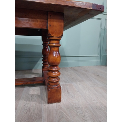 166 - Good quality pine country kitchen table raised on four turned legs with single stretcher. {74 cm H x... 