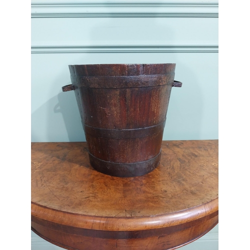 168 - 19th C. oak and metal bound log bucket with two handles. {30 cm H x 37 cm Dia.}.