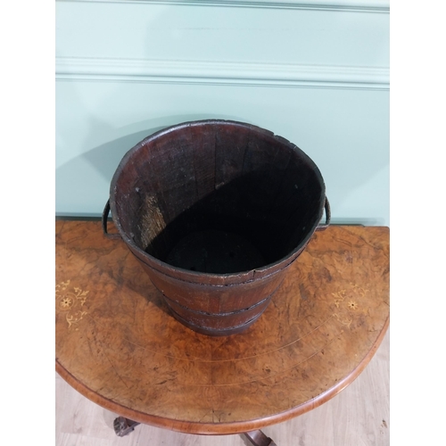 168 - 19th C. oak and metal bound log bucket with two handles. {30 cm H x 37 cm Dia.}.