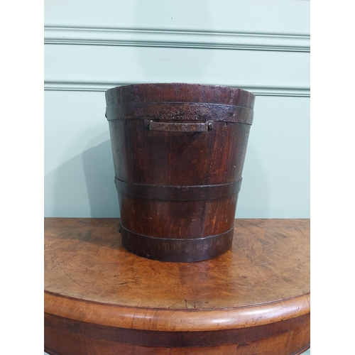 168 - 19th C. oak and metal bound log bucket with two handles. {30 cm H x 37 cm Dia.}.