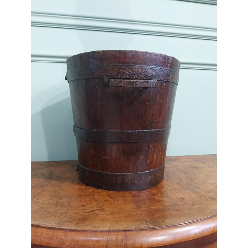 168 - 19th C. oak and metal bound log bucket with two handles. {30 cm H x 37 cm Dia.}.