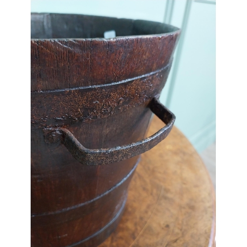 168 - 19th C. oak and metal bound log bucket with two handles. {30 cm H x 37 cm Dia.}.