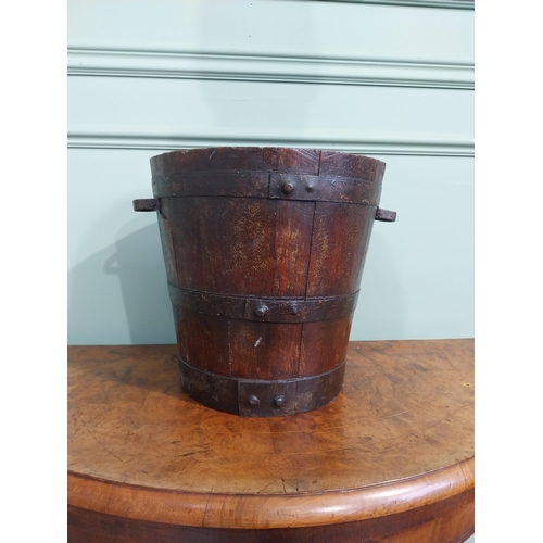 168 - 19th C. oak and metal bound log bucket with two handles. {30 cm H x 37 cm Dia.}.