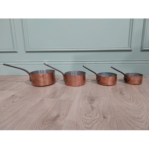 174 - Set of four graduated French copper saucepans. {15 cm H x 37 cm W x 19 cm D} to {13 cm H x 24 cm W x... 