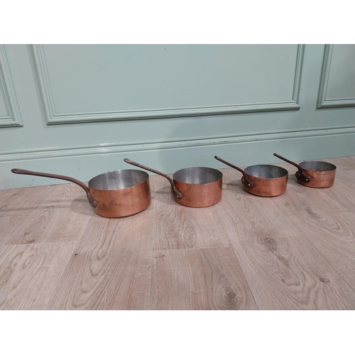 174 - Set of four graduated French copper saucepans. {15 cm H x 37 cm W x 19 cm D} to {13 cm H x 24 cm W x... 