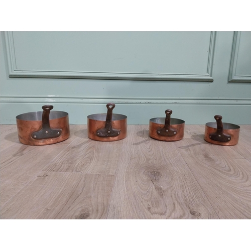 174 - Set of four graduated French copper saucepans. {15 cm H x 37 cm W x 19 cm D} to {13 cm H x 24 cm W x... 