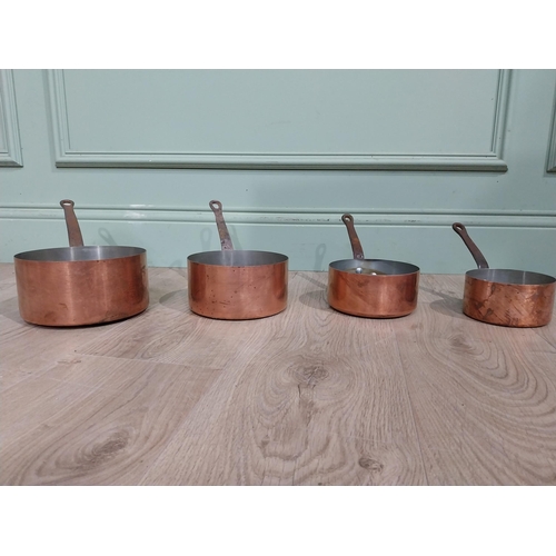 174 - Set of four graduated French copper saucepans. {15 cm H x 37 cm W x 19 cm D} to {13 cm H x 24 cm W x... 