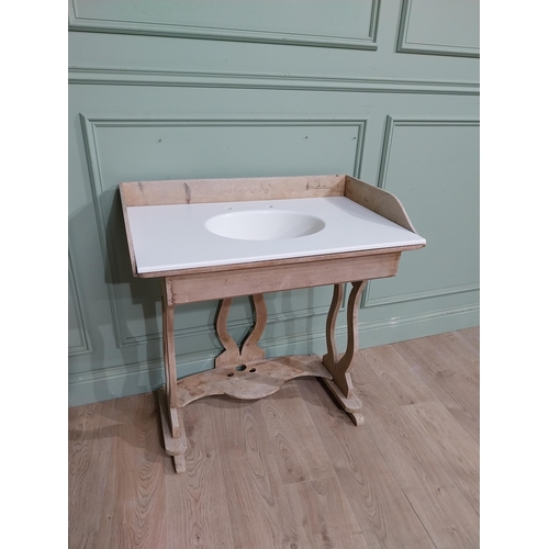 177 - Early 20th C. Pine washstand with gallery back and enamel sink raised on lyre supports and shaped st... 