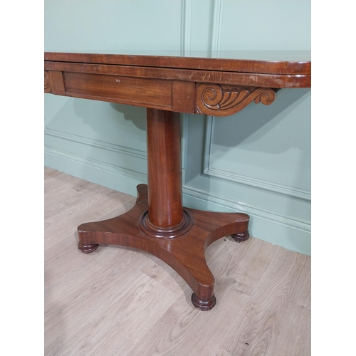 180 - William IV mahogany turn over leaf card table with turned column on plinth base. {72 cm H x 91 cm W ... 