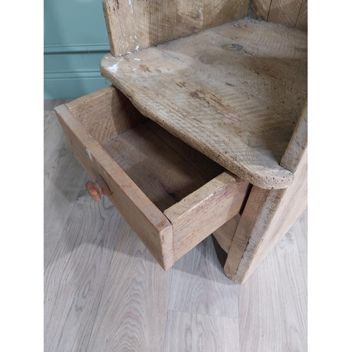 25 - Irish stripped pine porter�s chair with long drawer in frieze on square legs. {154 cm H x 51 cm W x ... 