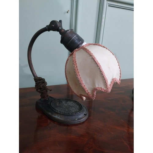 257 - Pair of Art Deco copper and cast iron lamps with cloth shades. {23 cm H x 13 cm W x 24 cm D}.