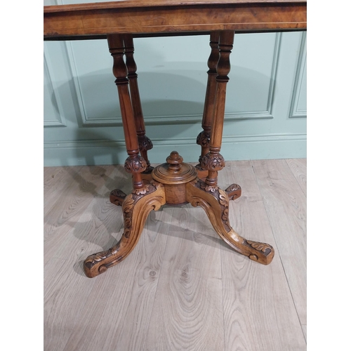 261 - 19th C. Burr walnut table raised on four turned columns and four outswept feet. {68 cm H x 104 cm W ... 