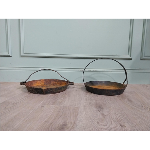 262 - Two early 20th C. Cast iron pans {15 cm H x 38 cm W x 30 cm D} approx.