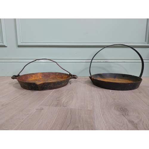 262 - Two early 20th C. Cast iron pans {15 cm H x 38 cm W x 30 cm D} approx.