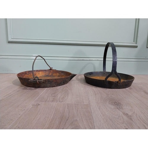 262 - Two early 20th C. Cast iron pans {15 cm H x 38 cm W x 30 cm D} approx.