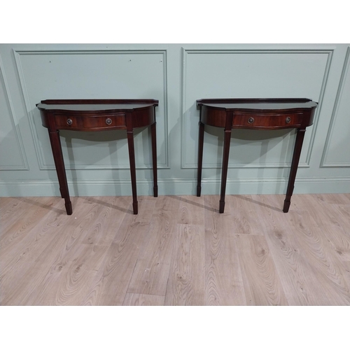 277 - Pair of mahogany shaped side tables in the Georgian style with drawer in frieze. {75 cm H x 82 cm W ... 