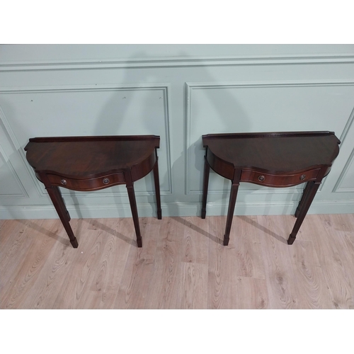 277 - Pair of mahogany shaped side tables in the Georgian style with drawer in frieze. {75 cm H x 82 cm W ... 