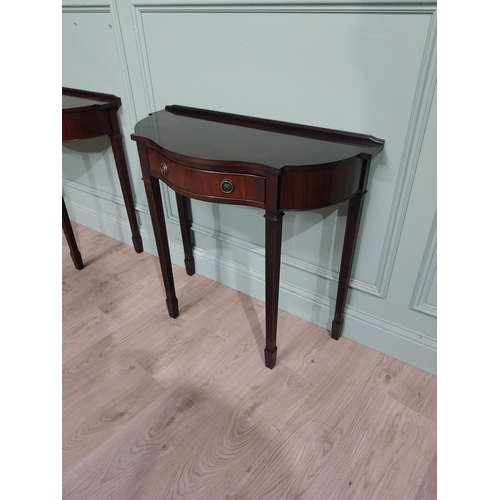 277 - Pair of mahogany shaped side tables in the Georgian style with drawer in frieze. {75 cm H x 82 cm W ... 