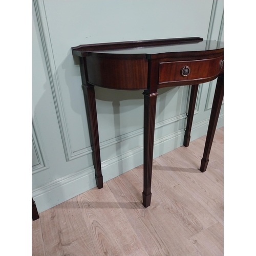 277 - Pair of mahogany shaped side tables in the Georgian style with drawer in frieze. {75 cm H x 82 cm W ... 