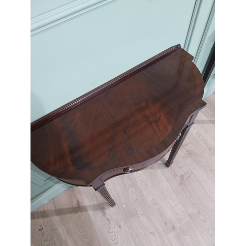 277 - Pair of mahogany shaped side tables in the Georgian style with drawer in frieze. {75 cm H x 82 cm W ... 