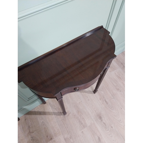 277 - Pair of mahogany shaped side tables in the Georgian style with drawer in frieze. {75 cm H x 82 cm W ... 