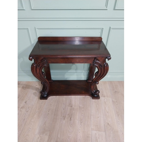 28 - Good quality William IV rosewood console table with gallery back raised on carved shaped legs on pla... 