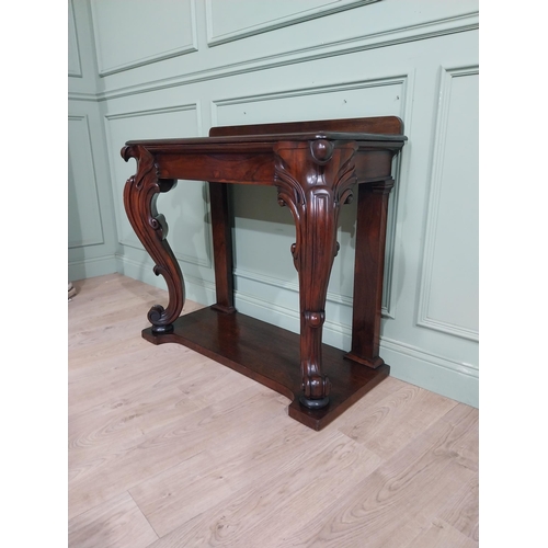 28 - Good quality William IV rosewood console table with gallery back raised on carved shaped legs on pla... 