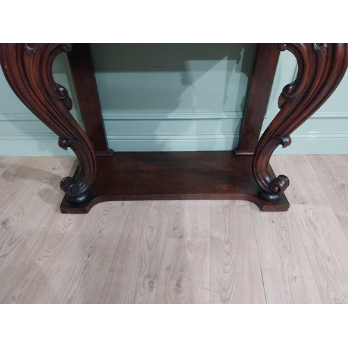 28 - Good quality William IV rosewood console table with gallery back raised on carved shaped legs on pla... 