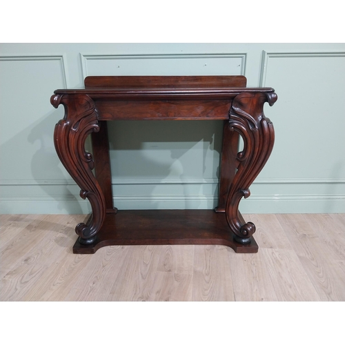 28 - Good quality William IV rosewood console table with gallery back raised on carved shaped legs on pla... 