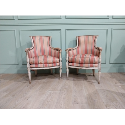 284 - Early 20th C. Pair of French painted pine upholstered armchairs.