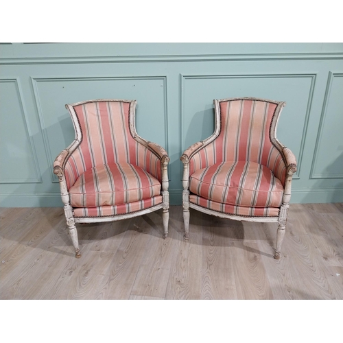 284 - Early 20th C. Pair of French painted pine upholstered armchairs.