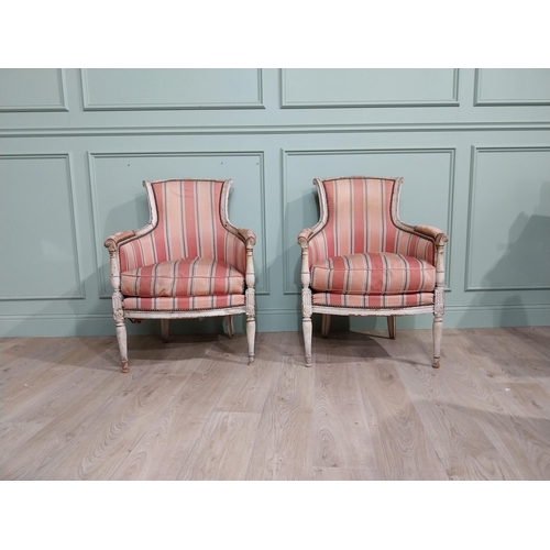 284 - Early 20th C. Pair of French painted pine upholstered armchairs.