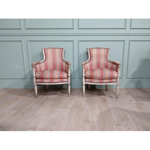 284 - Early 20th C. Pair of French painted pine upholstered armchairs.