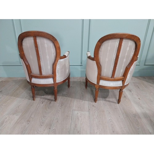 286 - Pair of Edwardian French walnut and upholstered armchairs. {84 cm H x 61 cm W x 55 cm D}.