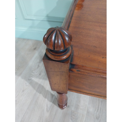 298 - 19th C. Mahogany two drawer coffee table. {57 cm H x 122 cm W x 48 cm D}.