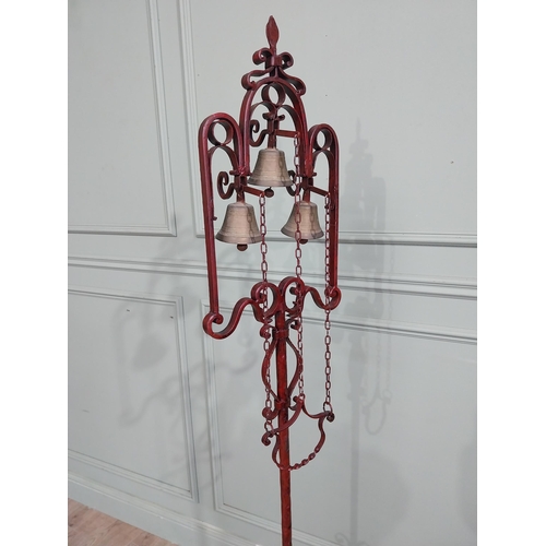 318 - Unusual decorative wrought iron house bell on single column with tripod base. {176 cm H x 50 cm Dia.... 