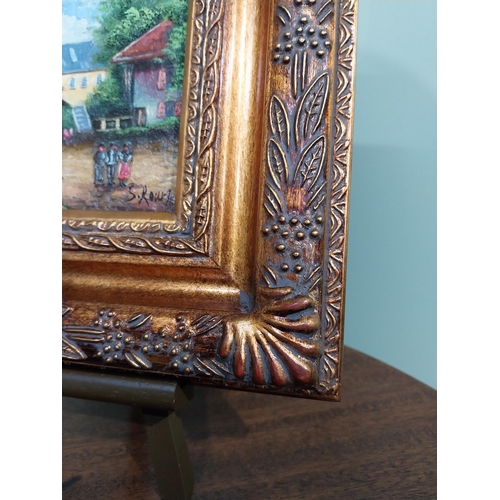 323 - Pair of oleographs mounted on ornate gilt framed oil on easel stands � Village Scene and Cafe Scene.... 