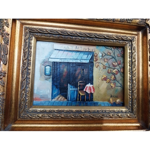 323 - Pair of oleographs mounted on ornate gilt framed oil on easel stands � Village Scene and Cafe Scene.... 