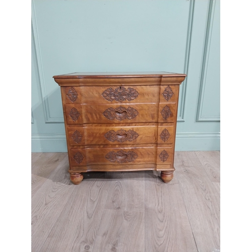 324 - 1950�s camphor wood bank of drawers with fitted interior above three long drawers with leaf decorati... 