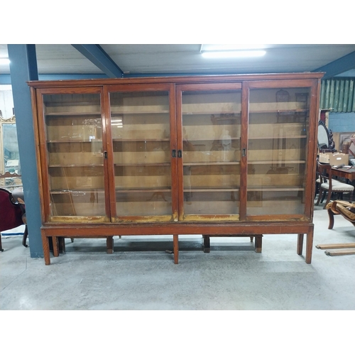 330 - Edwardian pine chemist shop glazed display cabinet on stand with square legs and sliding doors. {206... 